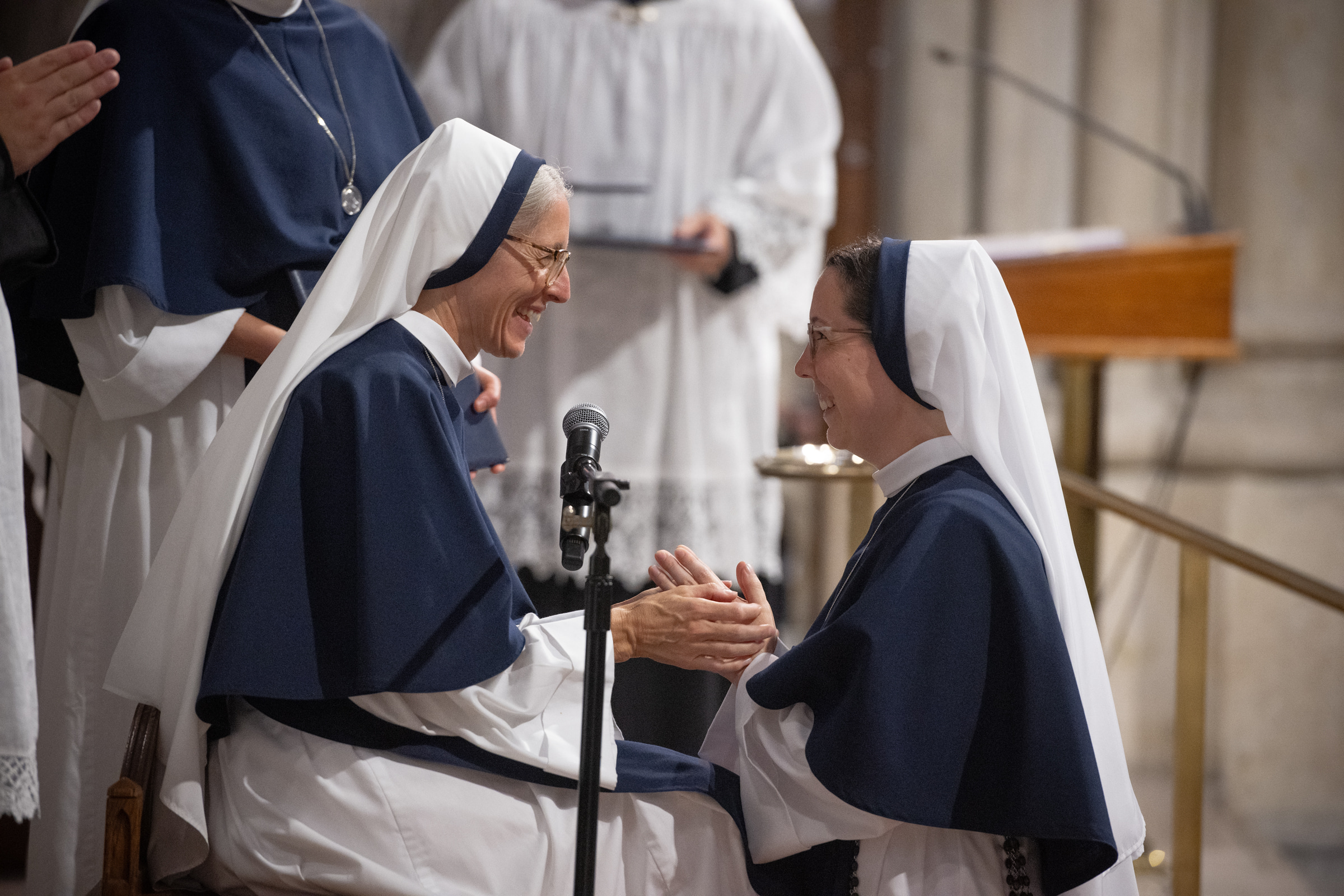 Sister Eden Marie, S.V., smiles as she professes her vows before Mother Mary Concepta.